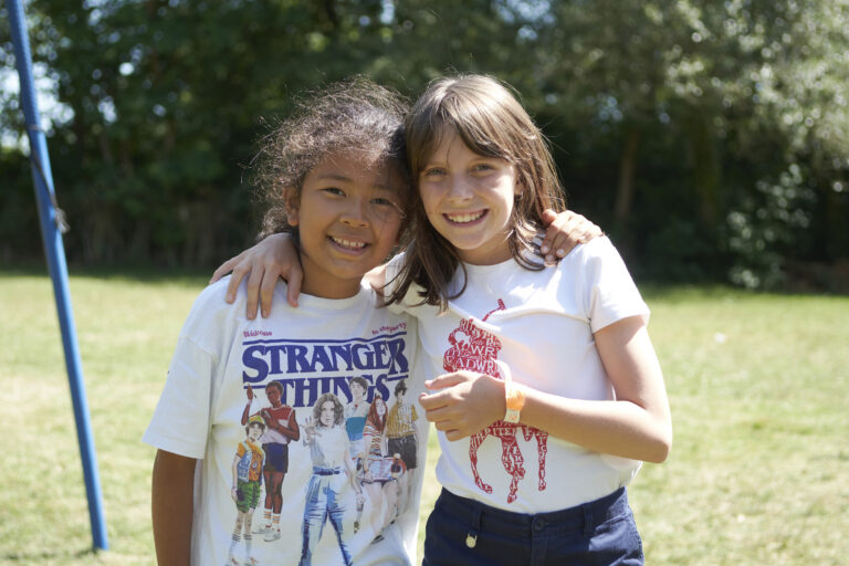 two happy girls on a summer young learner child on a young learner course