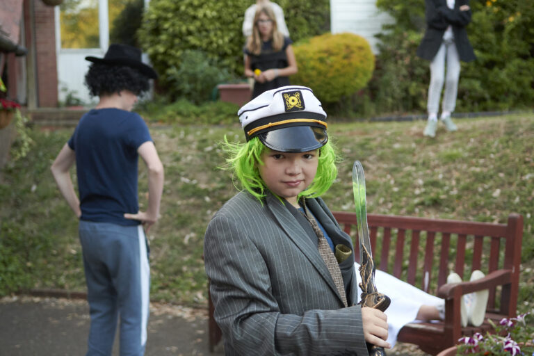 studious child on a young learner course Fancy dress captain